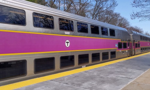 mbta commuter rail train near the block at odell park apartment as part of the beverly collection