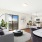 The Beverly Collection apartment with open floor plan, modern kitchen, and living area opening to private balcony with scenic views