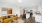 Stylish apartment at The Beverly Collection in Beverly MA showcasing modern kitchen, open floor plan, and cozy living area with vibrant furnishings