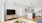 tv stand and kitchen at the beverly collection apartments