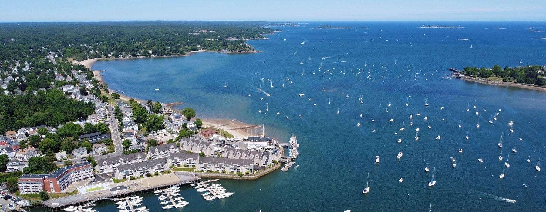 a body of water with boats in it and buildings around it