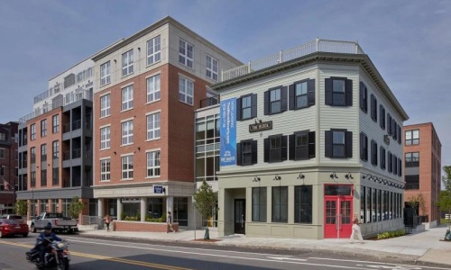 a large building with a street in front of it